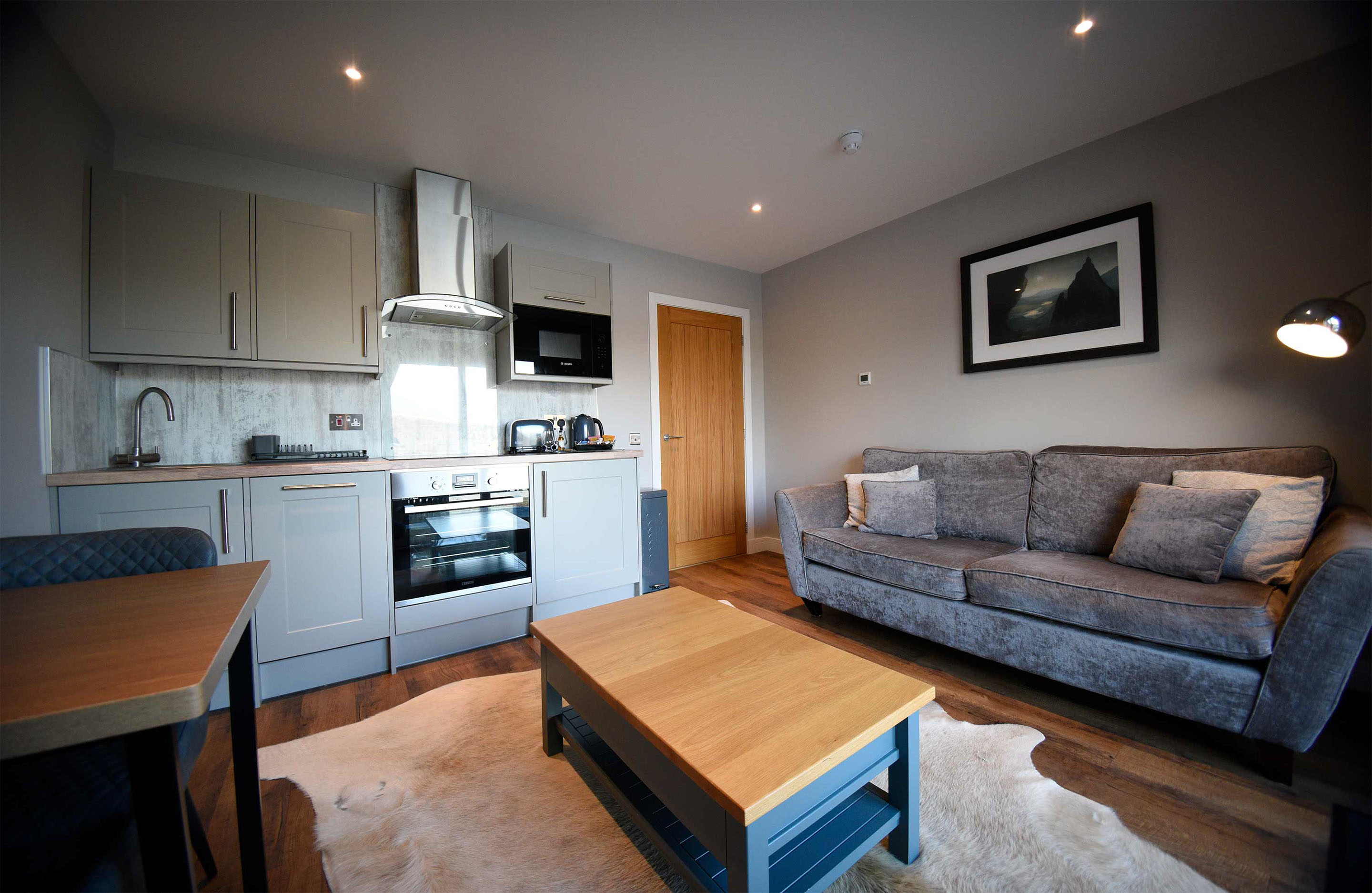 Scorr House self catering accommodation contains comfortable seating and a kitchen